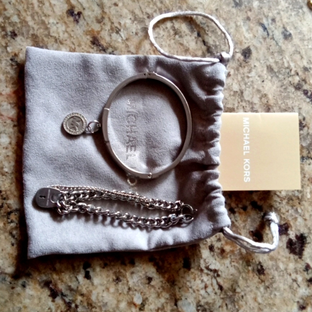 Michael khors bangel bracelets one size  and one silver bracelet with with a key